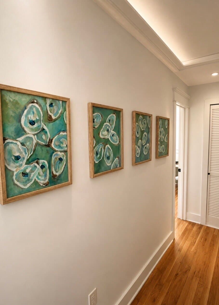 Oyster paintings line the hallway.